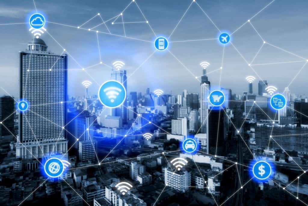 Smart city and wireless communication network, business district with office building, abstract image visual, internet of things concept
